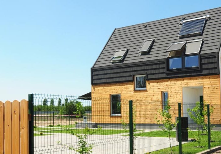 exterior view of home with vents and skylights